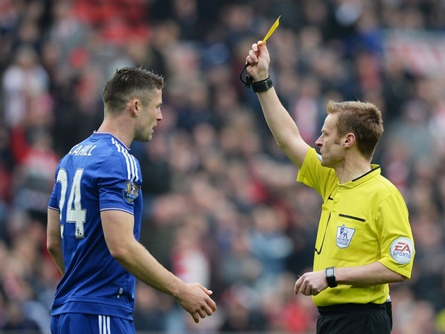Gary Cahill is shown yellow by Mike Jones during the Premier League match between Sunderland and Chelsea on May 7, 2016