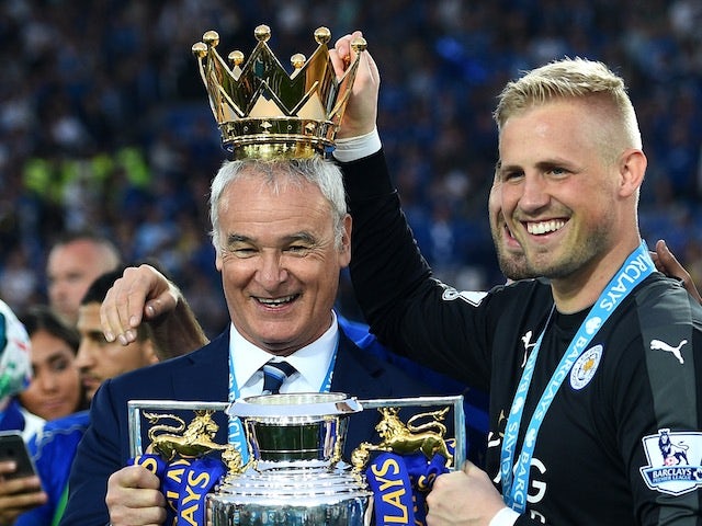 Claudio Ranieri and Kasper Schmeichel with the Premier League trophy on May 8, 2016