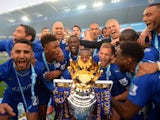 Leicester City players celebrate with the Premier League trophy on May 8, 2016