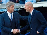 Manuel Pellegrini and Zinedine Zidane shake hands before the Champions League semi-final second leg between Real Madrid and Manchester City on May 4, 2016
