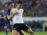 Marc Albrighton grapples with John Stones during the Premier League game between Leicester City and Everton on May 7, 2016
