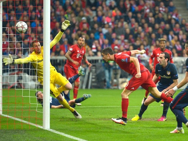 Robert Lewandowski scores Bayern Munich's second goal in the Champions League semi-final second leg against Atletico Madrid on May 3, 2016