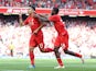 Roberto Firmino celebrates with Sheyi Ojo during the Premier League game between Liverpool and Watford on May 8, 2016