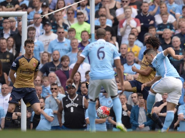 Sergio Aguero scores the opener during the Premier League game between Manchester City and Arsenal on May 8, 2016