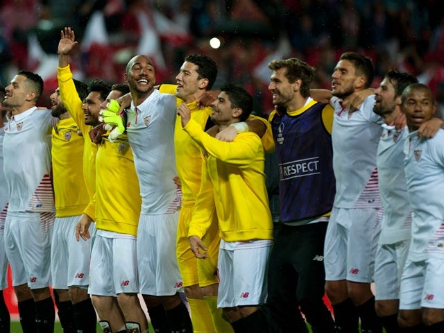 Sevilla players celebrate their victory over Shakhtar Donetsk at the end of the UEFA Europa League semi-final second leg on May 5, 2016
