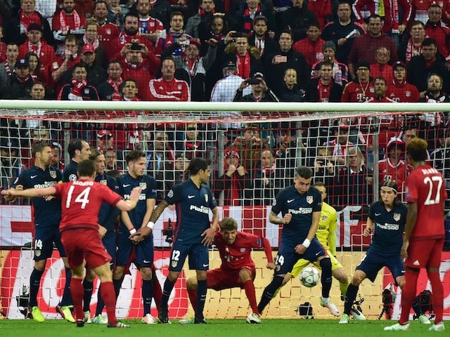 Xabi Alonso scores Bayern Munich's first goal in the Champions League semi-final second leg against Atletico Madrid on May 3, 2016