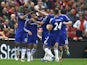 Chelsea players celebrate Eden Hazard's opener in the Premier League clash with Liverpool at Anfield on May 11, 2016