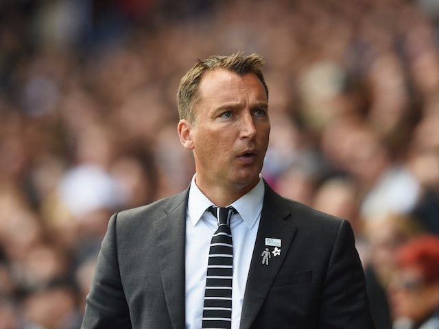 A badge-laden Darren Wassall watches on during the Championship playoff semi-final between Derby County and Hull City on May 14, 2016