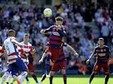 Big Gerard Pique heads the ball during the La Liga game between Granada and Barcelona on May 14, 2016