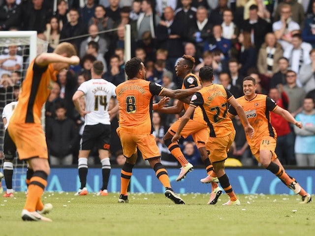 Hull City players celebrate a goal during the Championship playoff semi-final between Derby County and Hull City on May 14, 2016