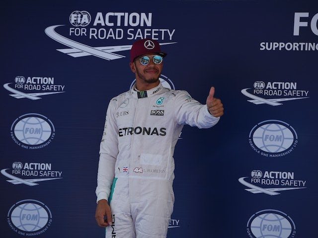 Lewis Hamilton celebrates being on pole for the Spanish GP on May 14, 2016