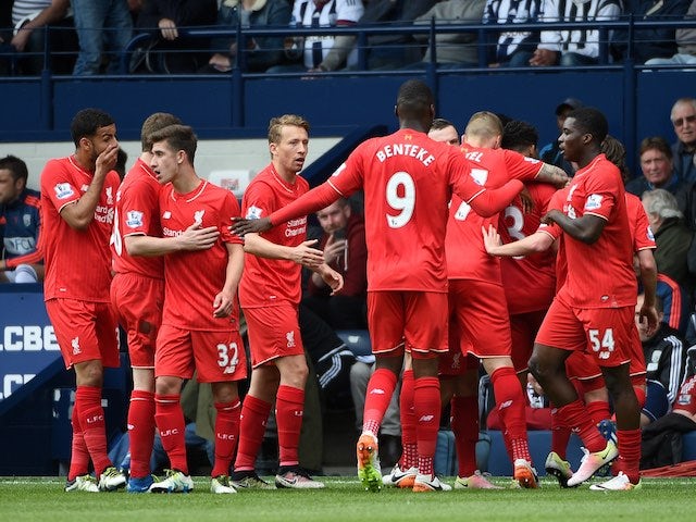 Liverpool players celebrate scoring during the Premier League game between West Bromwich Albion and Liverpool on May 15, 2016