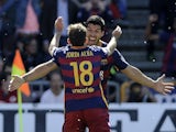 Luis Suarez celebrates opening the scoring with Jordi Alba during the La Liga game between Granada and Barcelona on May 14, 2016