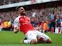 Olivier Giroud celebrates scoring during the Premier League game between Arsenal and Aston Villa on May 15, 2016