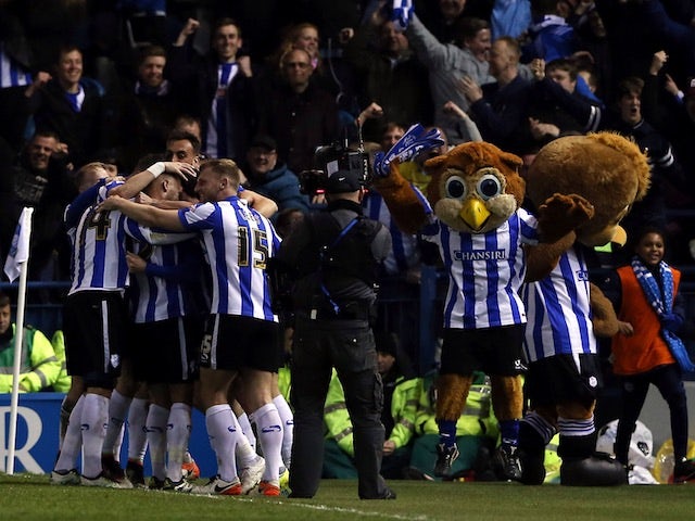 Sheffield Wednesday celebrate Kieran Lee's goal in the Championship playoff semi-finals on May 13, 2016