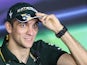 Vitaly Petrov speaks during a press conference at the Yas Marina circuit on November 1, 2012