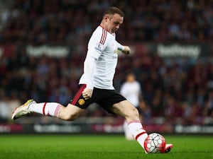Howe backs Rooney in midfield role