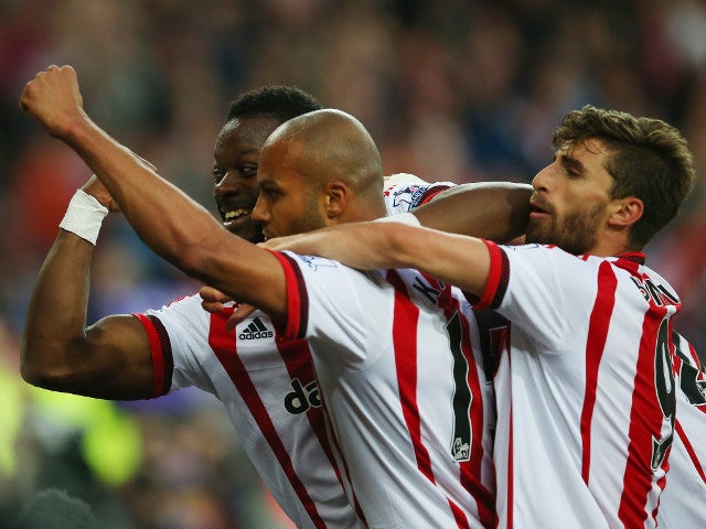 Sunderland's Younes Kaboul leads the celebrations on the way to a 3-0 win over Everton on May 11, 2016 that secured his side's Premier League survival