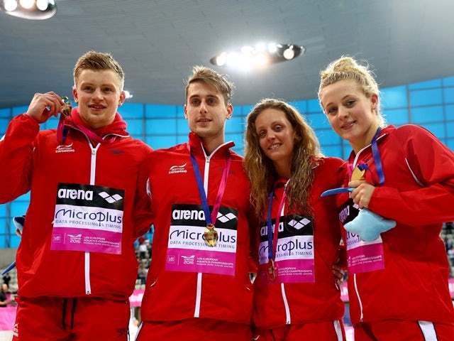 Great Britain's Adam Peaty, Chris Walker-Hebborn, Francesca Halsall and Siobhan-Marie O'Connor pose with their gold medals after winning the mixed 4x100m medley Final on day nine of the 33rd LEN European Swimming Championships 2016 at the London Aquatics 