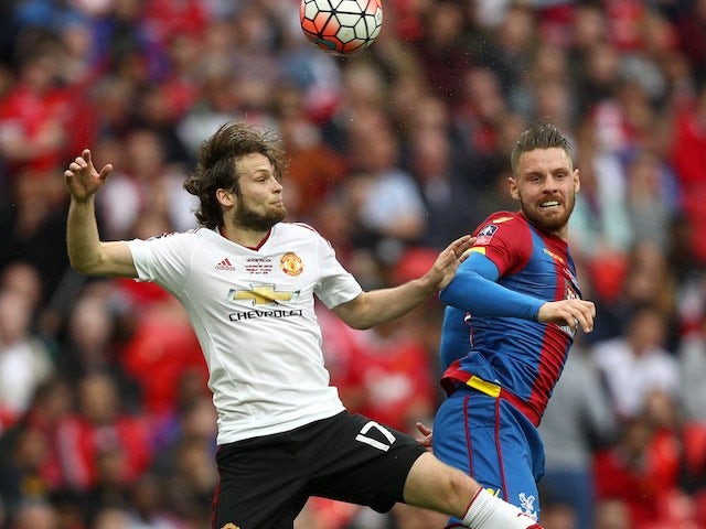 Daley Blind and Connor Wickham in action during the FA Cup final between Crystal Palace and Manchester United on May 21, 2016
