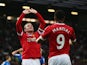 Wayne Rooney of Manchester United celebrates with Anthony Martial as he scores their first goal against Bournemouth at Old Trafford on May 17, 2016