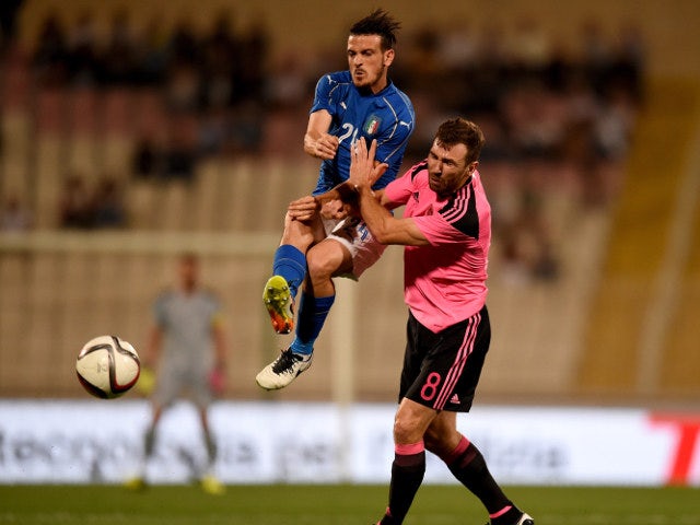 Alessandro Florenzi of Italy (L) in action during the international friendly between Italy and Scotland on May 29, 2016 in Malta