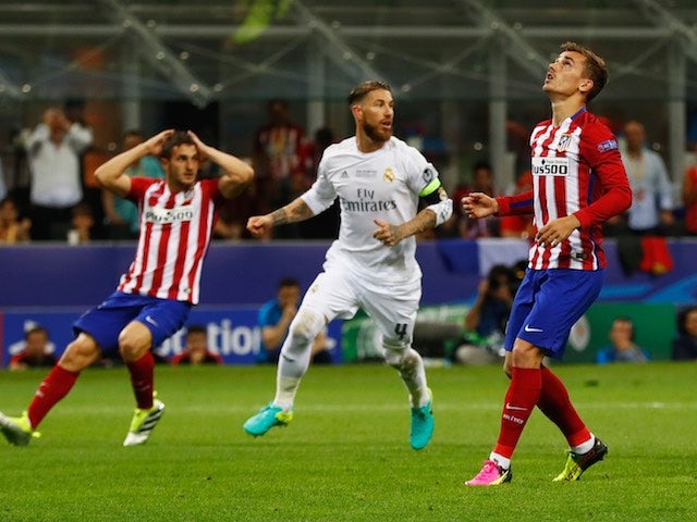 Antoine Griezmann reacts to missing a pen during the Champions League final between Real Madrid and Atletico Madrid on May 28, 2016