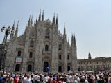 Atletico Madrid and Real Madrid fans gather outside the Piazza Duomo in Milan ahead of the Champions League final between the two sides on May 28, 2016