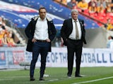 Carlos Carvalhal and Steve Bruce watch on during the Championship playoff final between Hull City and Sheffield Wednesday on May 28, 2016