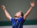 David Goffin celebrates winning his third-round match at the French Open on May 28, 2016