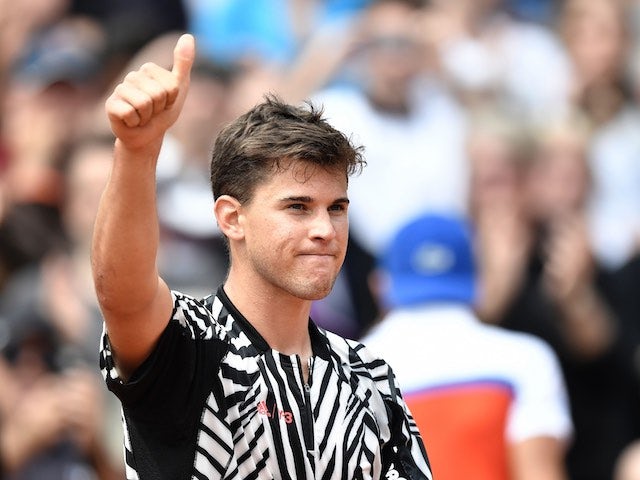 Dominic Thiem celebrates victory in the second round of the French Open on May 26, 2016