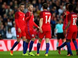 England players celebrate Wayne Rooney's goal during their 2-1 Euro 2016 warm-up win over Australia at the Stadium on Light on May 27, 2016