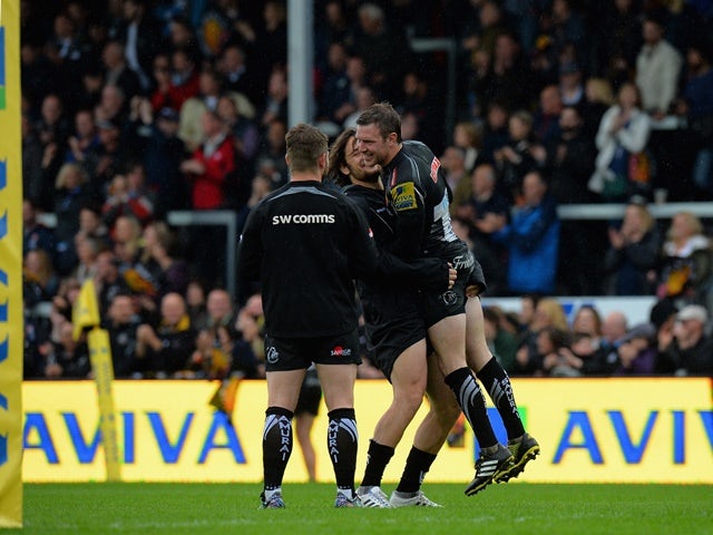 Harry Williams and Will Chudley of Exeter Chiefs celebrate reaching the Aviva Premiership final after beating Wasp at Sandy Park on May 21, 2016