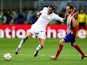 Gareth Bale holds off Juanfran during the Champions League final between Real Madrid and Atletico Madrid on May 28, 2016