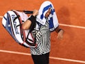 Jo-Wilfried Tsonga walks off the court after retiring during the French Open on May 28, 2016
