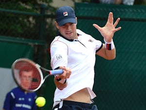 Isner ends Edmund's French Open campaign