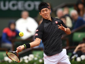Kei Nishikori battles into last four