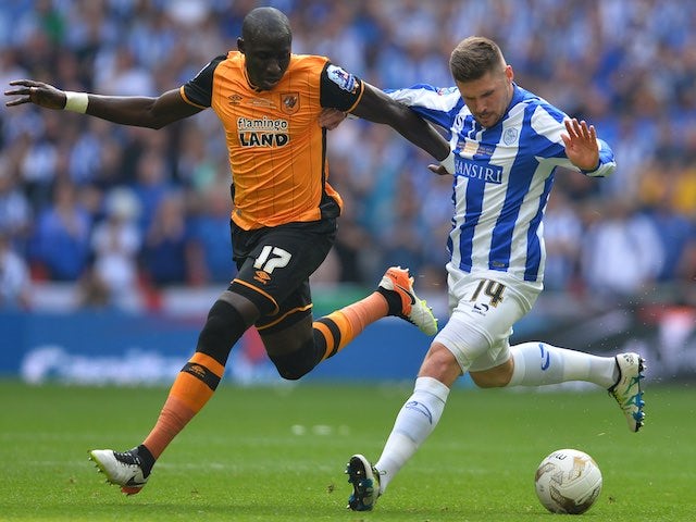 Mohamed Diame and Gary Hooper in action during the Championship playoff final between Hull City and Sheffield Wednesday on May 28, 2016