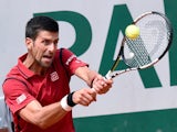 Novak Djokovic returns the ball to Steve Darcis at the French Open in Paris on May 26, 2016