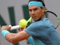 Rafael Nadal returns the ball to Sam Groth at the French Open in Paris on May 24, 2016