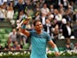 Rafael Nadal celebrates victory in round two of the French Open on May 26, 2016