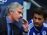 Jose Mourinho talks to Rui Faria during the Premier League match between Manchester City and Chelsea at the Etihad Stadium on August 16, 2015
