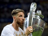 Sergio Ramos kisses the trophy after the Champions League final between Real Madrid and Atletico Madrid on May 28, 2016