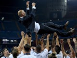Zinedine Zidane is given the bumps after the Champions League final between Real Madrid and Atletico Madrid on May 28, 2016