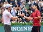 Andy Murray congratulates Novak Djokovic on winning the men's final match at the French Open on June 5, 2016