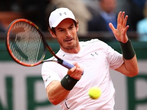 Murray loses to Federer in return to action