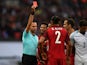 Portugal defender Bruno Alves is shown a red card for a challenge on Harry Kane during his side's match against England at Wembley on June 2, 2016