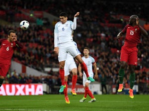 England defender Chris Smalling scores the winning goal in his side's 1-0 victory over Portugal at Wembley on June 2, 2016