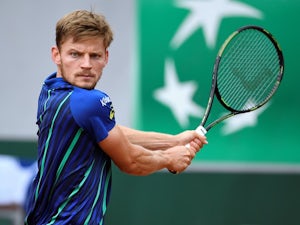 Goffin maintains London hopes with win over Mahut