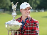 Jordan Spieth poses with the trophy after winning the Dean & Deluca Invitational on May 29, 2016